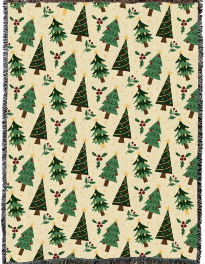 Woven throw blanket with a repeating pattern of decorated Christmas trees and sprigs of holly on a cream background.