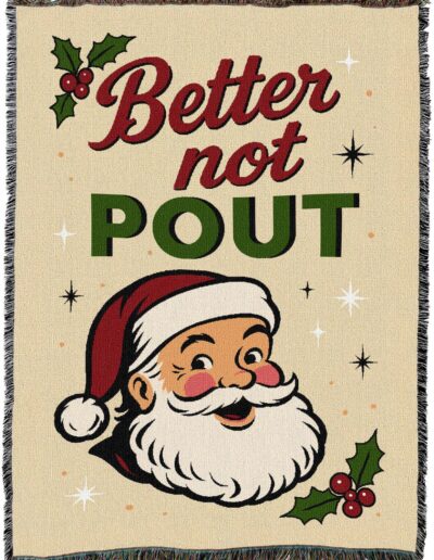 Woven blanket featuring a smiling Santa Claus illustration, holly accents, and the text Better not POUT.
